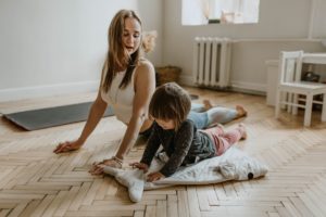 mom and child exercising
