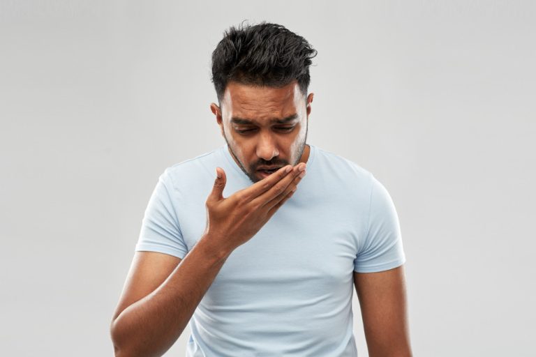 man with bad breath concept of oral hygiene