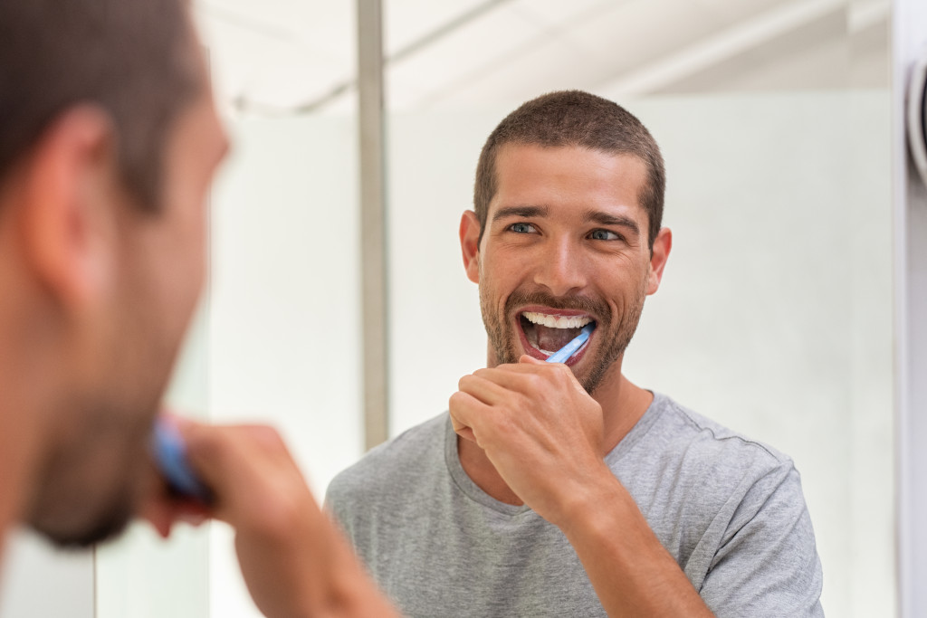 Man brushing teeth