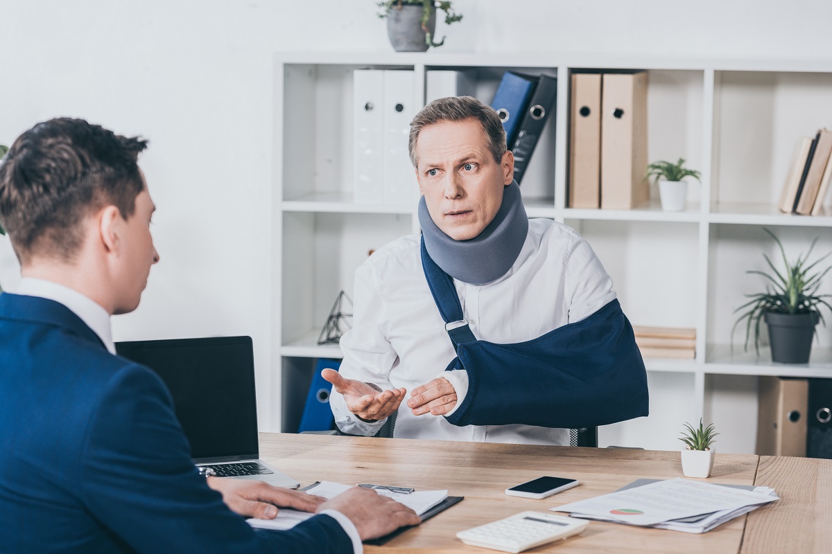 discussion between financial advisor and injured man