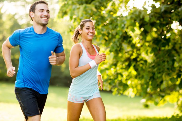 a couple jogging in the park