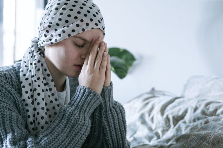 woman with cancer praying